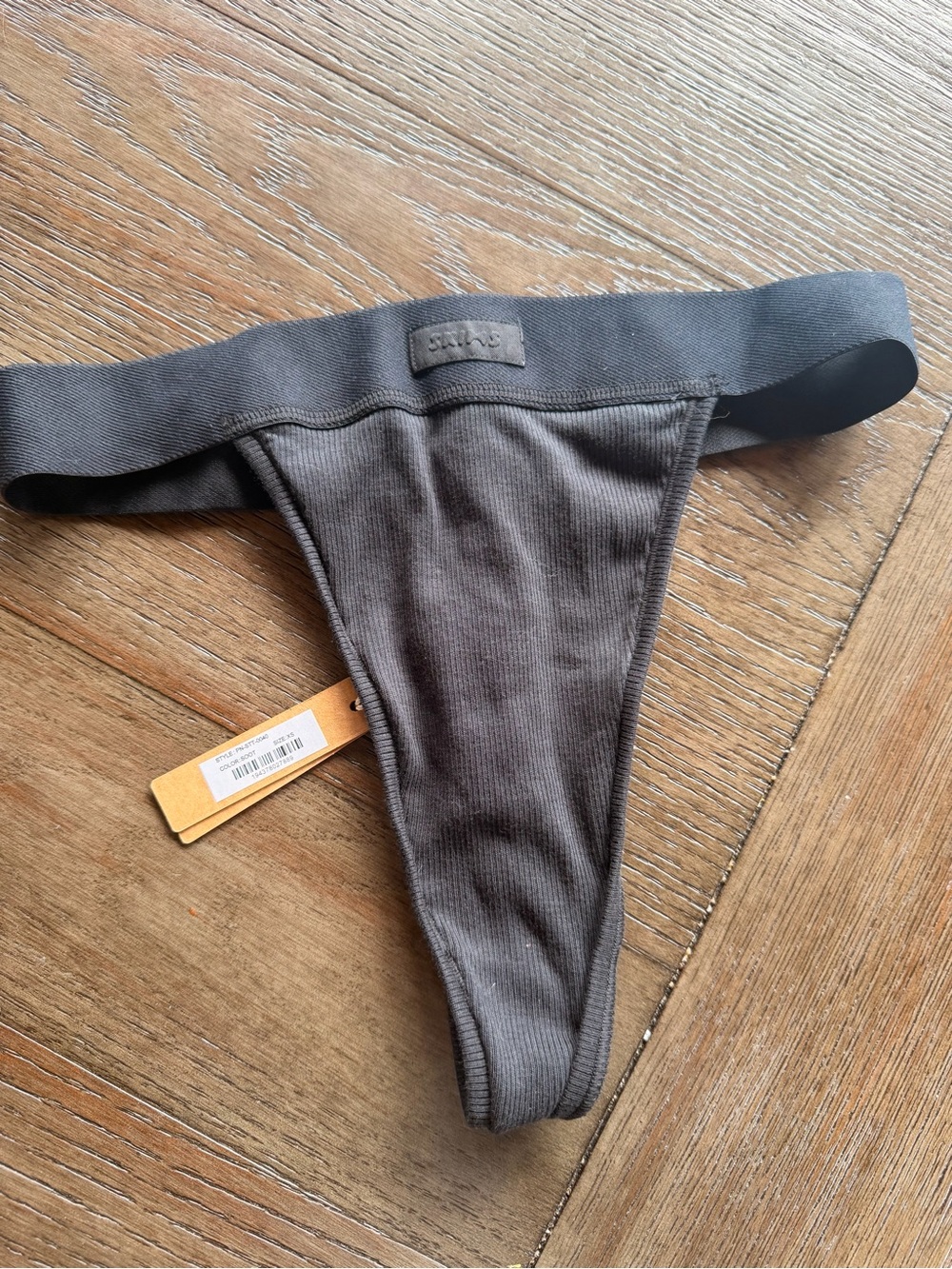 SKIMS Ribbed Thong Panty in Black